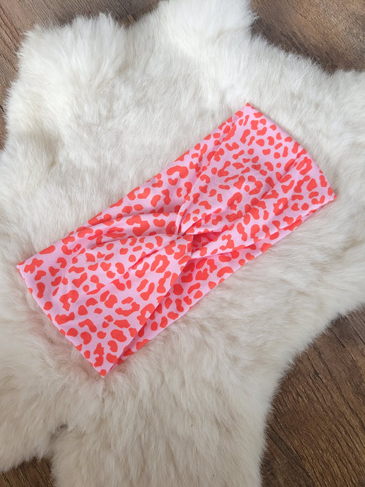 Pink with red leopard